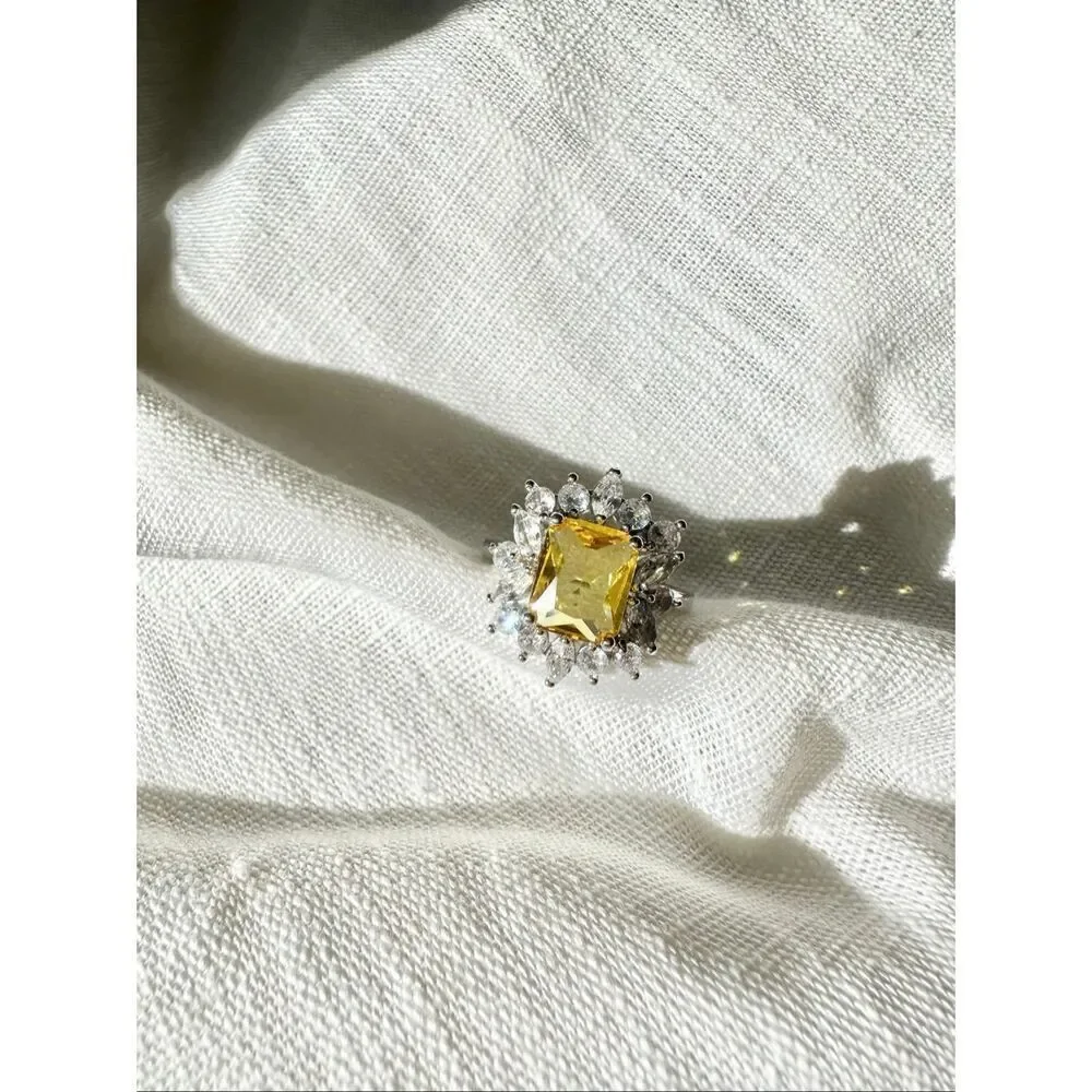 Yellow elongated radiant cut canary cubic zirconia cocktail ring